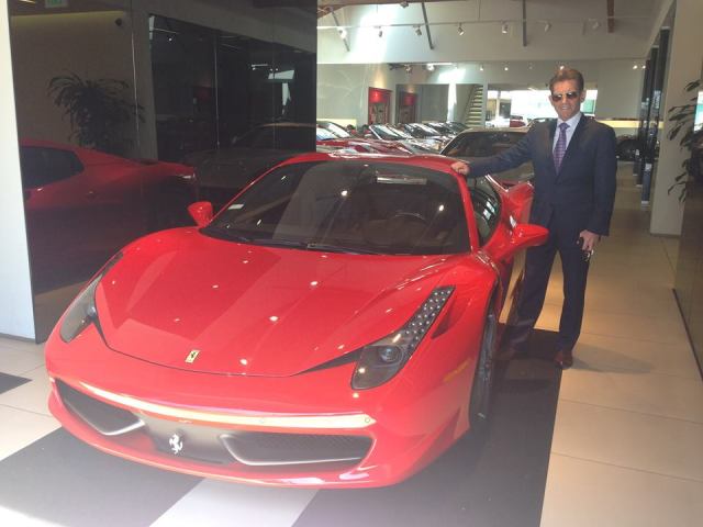 Kenny standing next to 2014 Ferrari 458 Italia